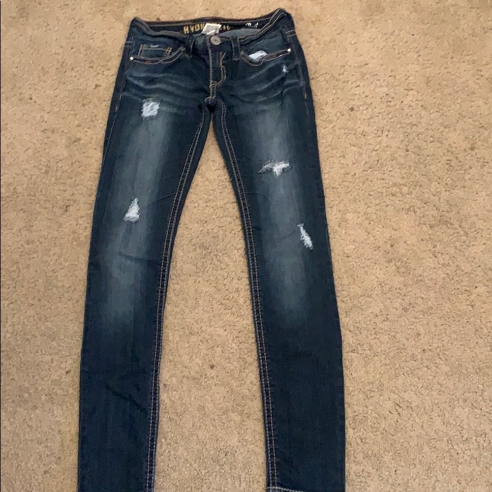 Hydraulic ripped jeans